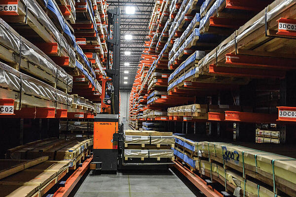 Multidirectional sideloader in a metal service center