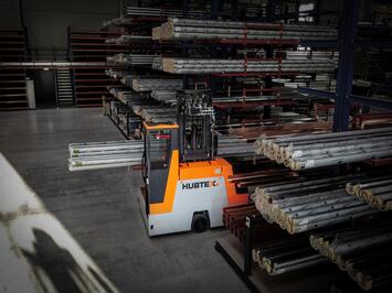 Basix multi-directional forklift transports pipes in narrow aisles