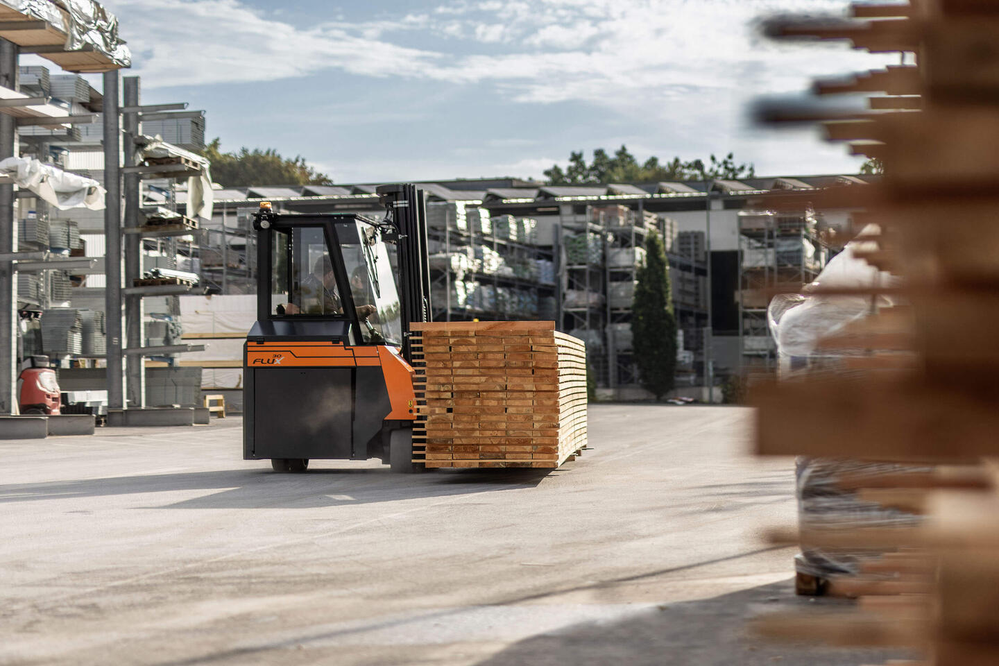 Forklift transports wood